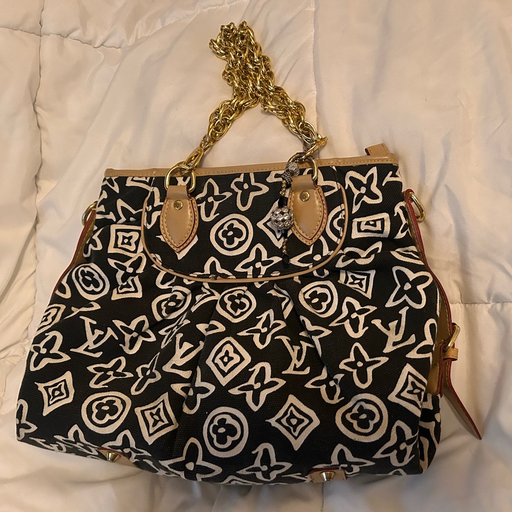Black and white with gold chains shoulder bag